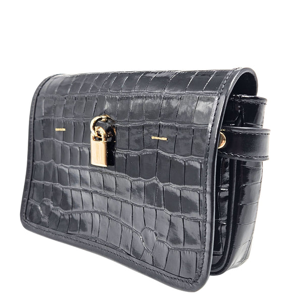 Black crocodile-patterned handbag with gold clasp on a white background