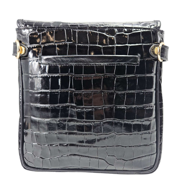 Black crocodile-patterned handbag with gold accents on a white background