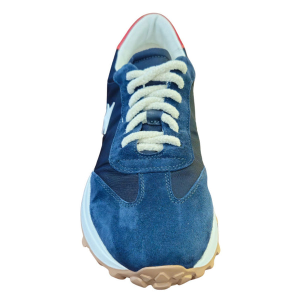 Blue sneaker with white laces on a white background