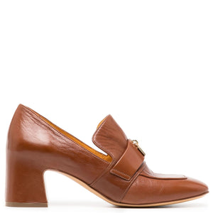 Brown leather shoe with a block heel on a white background