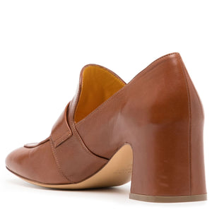 Brown leather shoe on a white background