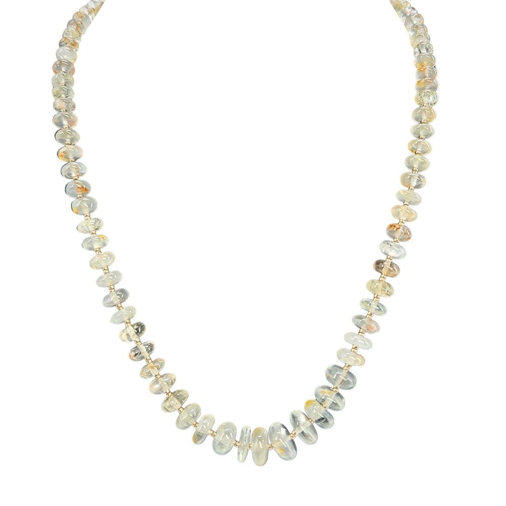 Necklace with small, round, multicolored beads on a white background