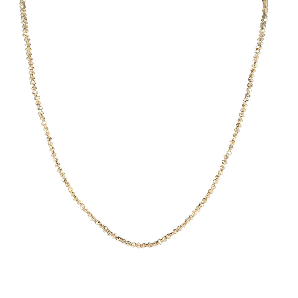 Gold chain necklace on a white background