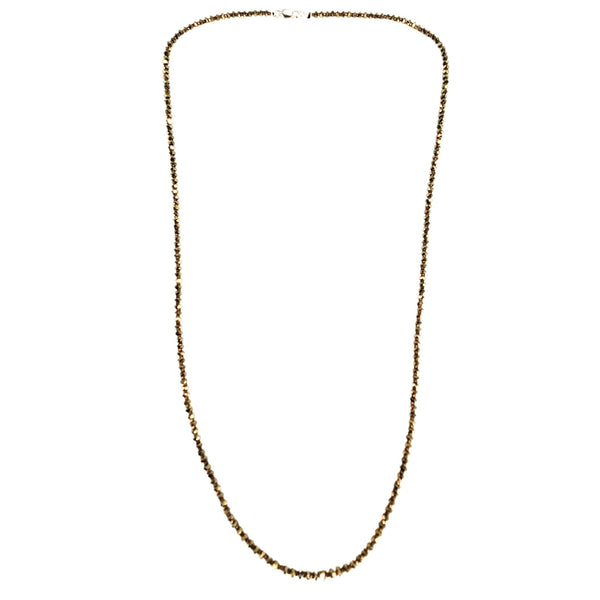 Gold chain necklace on a white background