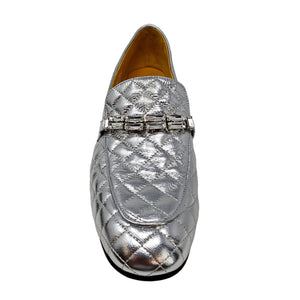 Silver loafers with a textured pattern on a white background