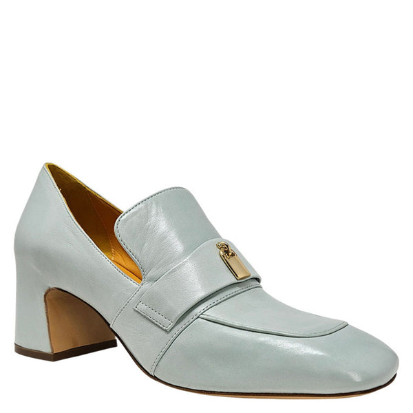 Light blue loafer shoe with a gold buckle on a white background