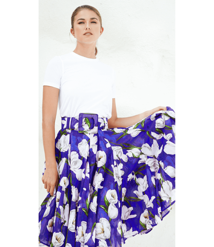 Cobalt blue floral skirt with white tulips and green stems, gathered pleats, A-line
