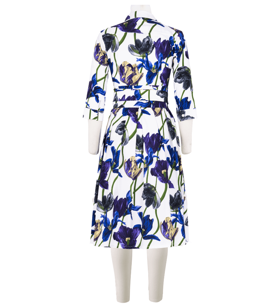 
                      
                        A knee-length dress with a collared neckline, three-quarter sleeves, and a flared skirt. Features a bold allover abstract pattern and fitted waist.
                      
                    