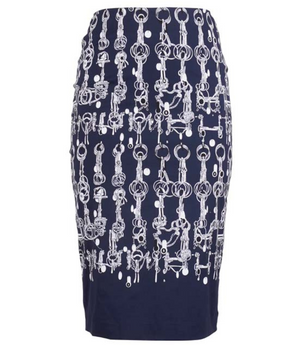 A knee-length dress with a collared neckline, three-quarter sleeves, and a flared skirt. Features a bold allover abstract pattern and fitted waist.