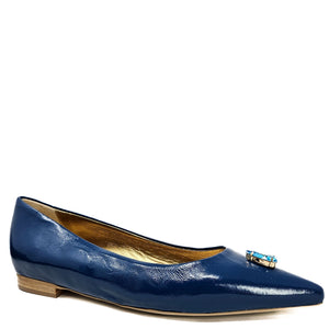 Blue shoe with a decorative buckle on a white background