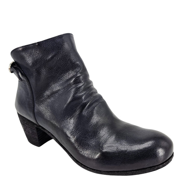 Black leather ankle boot on a white background