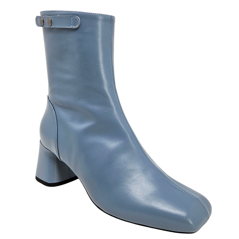 Light blue ankle boot with block heel, side eyelets and pull tab.