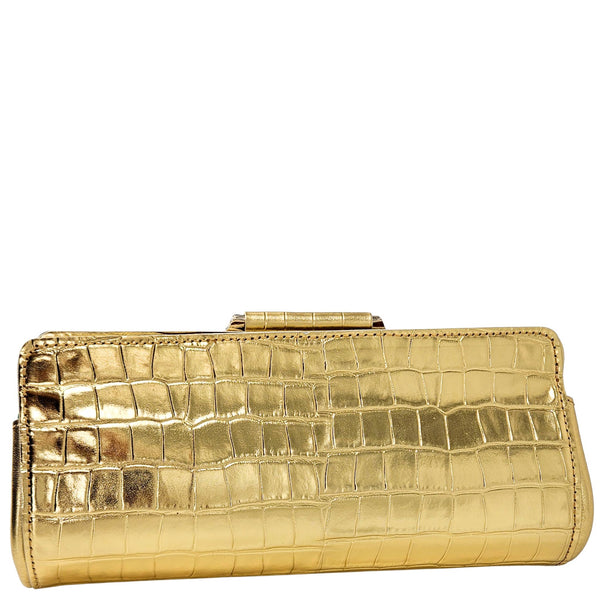 Gold clutch with crocodile texture on a white background