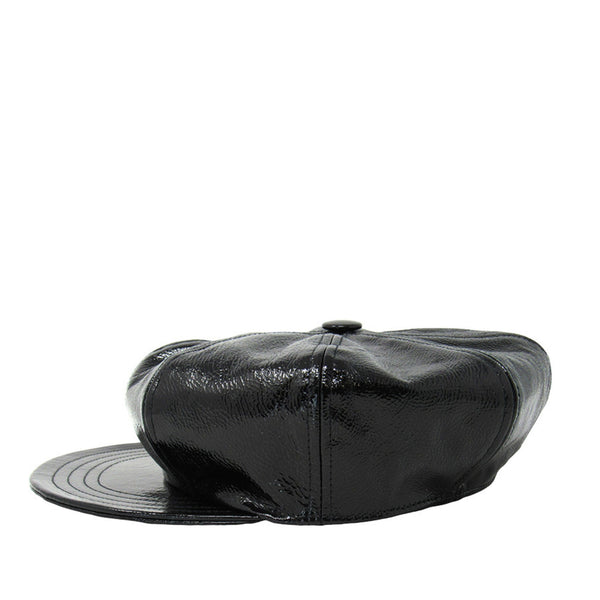 Black leather beret on a white background