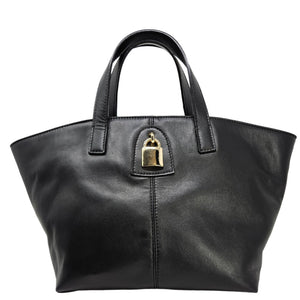 Black handbag with a gold lock on a white background