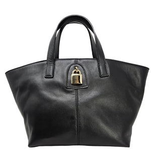 Black handbag with a gold lock on a white background