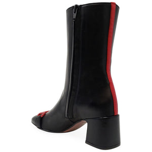 Black boot with a red stripe on a white background