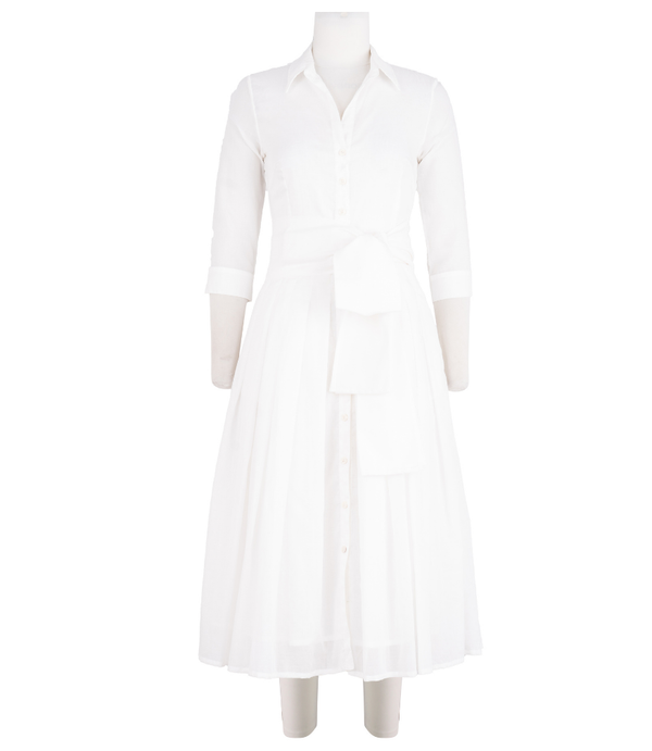 A knee-length dress with a collared neckline, three-quarter sleeves, and a flared skirt. Features a bold allover abstract pattern and fitted waist.