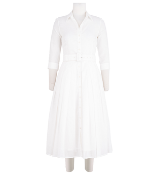 A knee-length dress with a collared neckline, three-quarter sleeves, and a flared skirt. Features a bold allover abstract pattern and fitted waist.