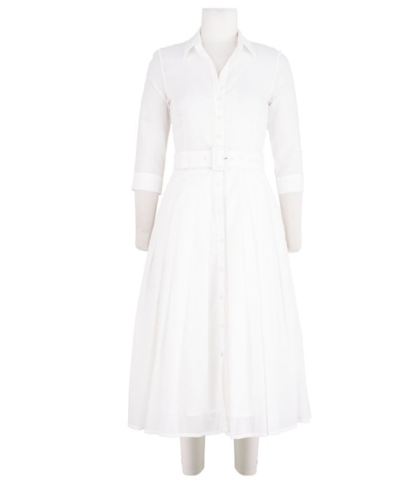 A knee-length dress with a collared neckline, three-quarter sleeves, and a flared skirt. Features a bold allover abstract pattern and fitted waist.