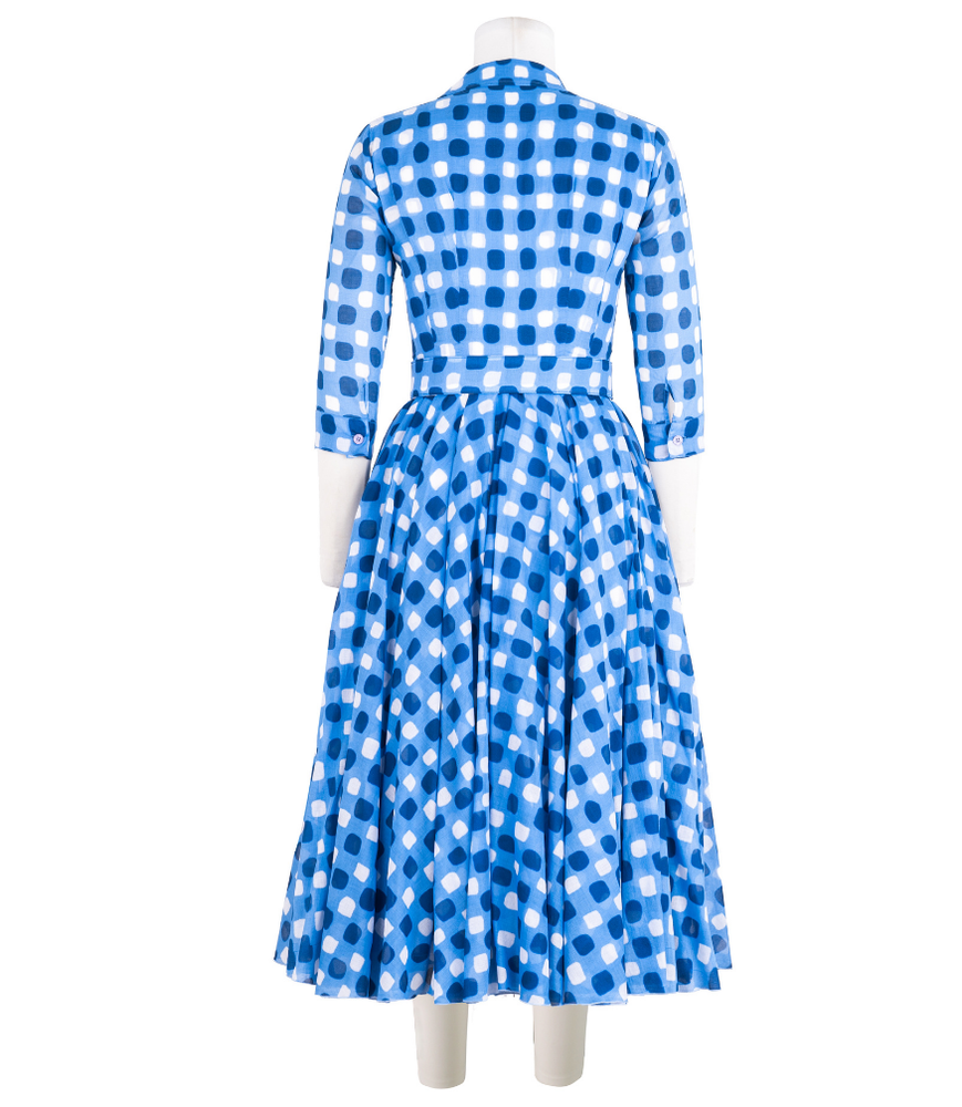 
                      
                        A knee-length dress with a collared neckline, three-quarter sleeves, and a flared skirt. Features a bold allover abstract pattern and fitted waist.
                      
                    