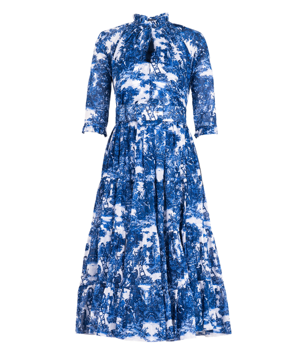 A knee-length dress with a collared neckline, three-quarter sleeves, and a flared skirt. Features a bold allover abstract pattern and fitted waist.
