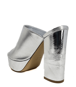 Open-toe platform mule with high block heel and wide upper strap. Features a smooth, metallic-textured finish and slip-on design for elevated wear.