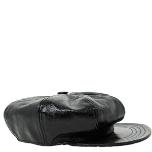 Black leather cap on a white background