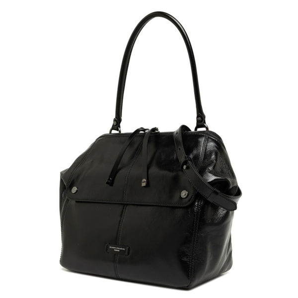 Black handbag with a shoulder strap on a white background