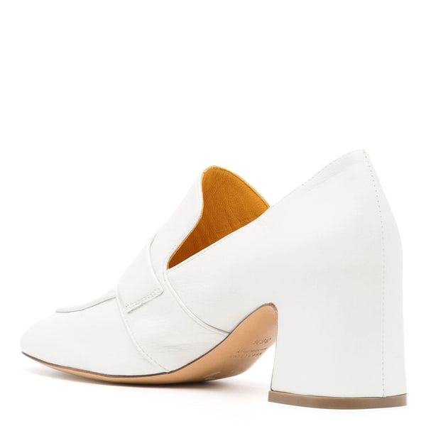 White loafers with brown insole on a white background