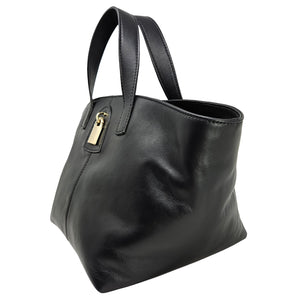 Black leather handbag with a gold zipper on a white background