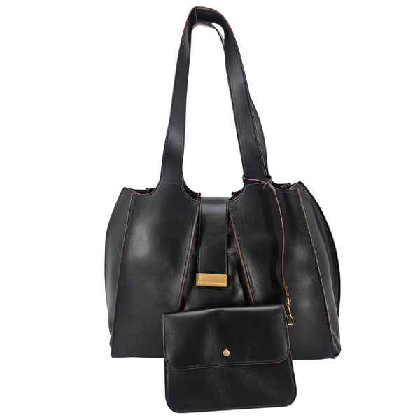 A sleek, black polished leather handbag with a wide opening, two top handles, and a horizontal gold bar accent on the front.