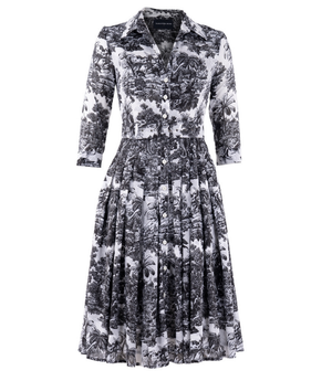 A knee-length dress with a collared neckline, three-quarter sleeves, and a flared skirt. Features a bold allover abstract pattern and fitted waist.