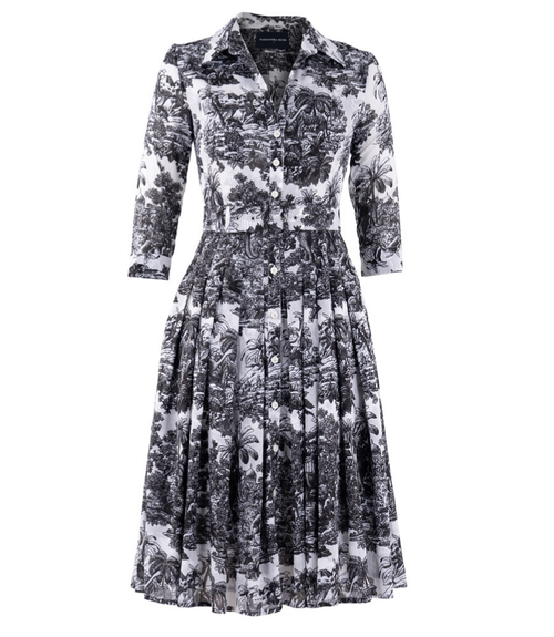 A knee-length dress with a collared neckline, three-quarter sleeves, and a flared skirt. Features a bold allover abstract pattern and fitted waist.
