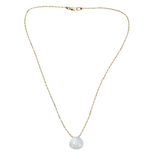 Necklace with a large pearl pendant on a white background
