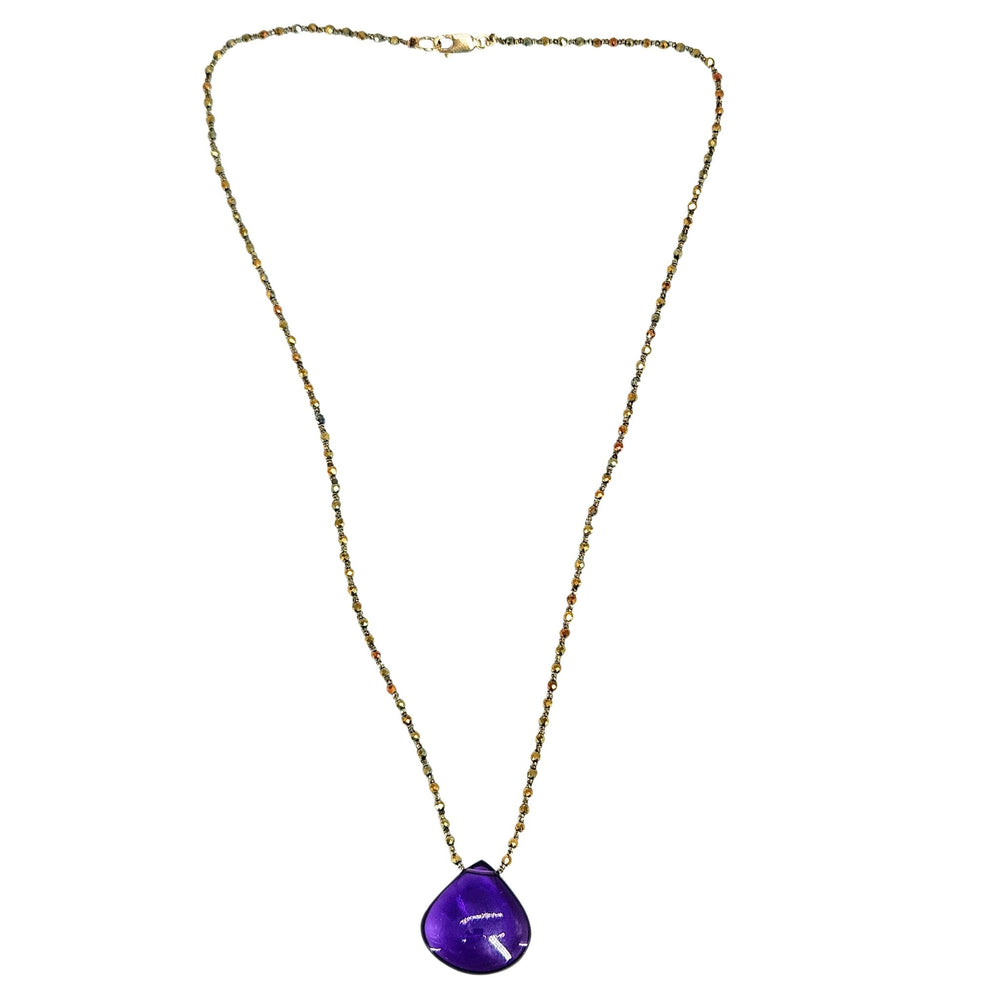 Teardrop pendant necklace featuring a purple gem drop framed in metal on chain