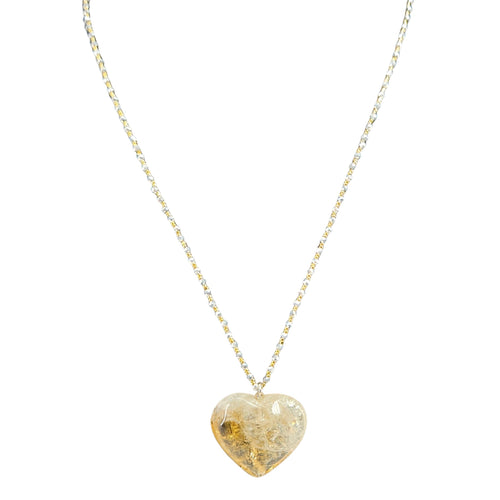 Heart-shaped pendant necklace on a white background