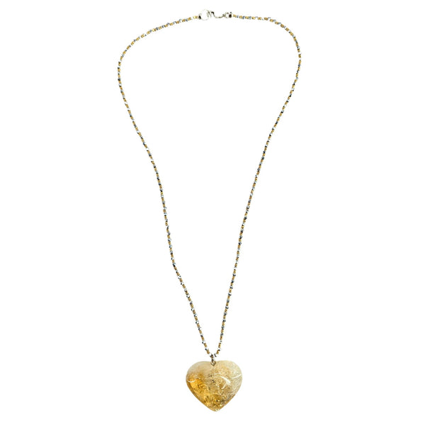Necklace with a heart-shaped pendant on a white background