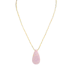 Necklace with a pink teardrop pendant on a white background