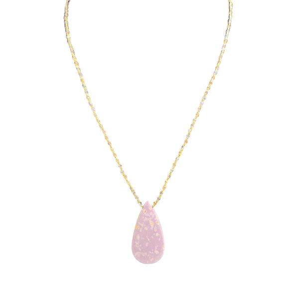 Necklace with a pink teardrop pendant on a white background