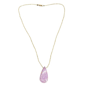 Necklace with a pink teardrop pendant on a white background