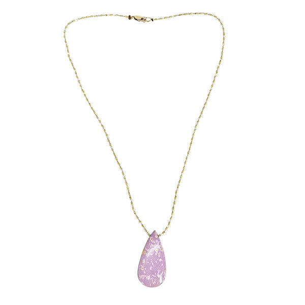 Necklace with a pink teardrop pendant on a white background