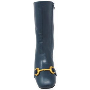 Blue knee-high boot with a yellow buckle on a white background