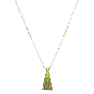 Necklace with a triangular pendant on a white background