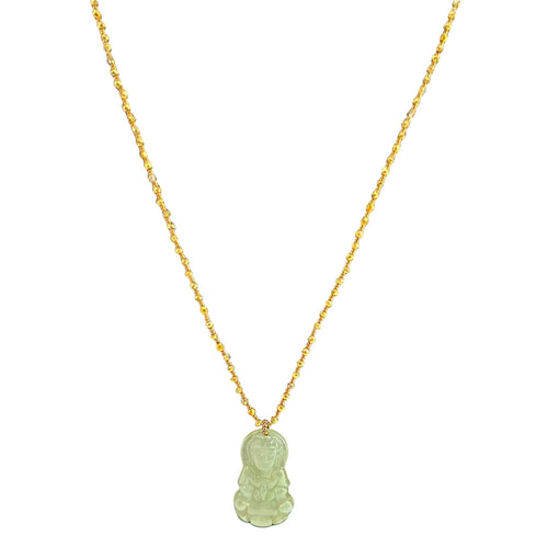 Gold necklace with a green pendant on a white background
