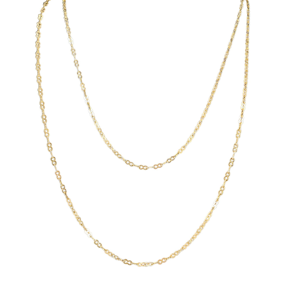 Gold chain necklace on a white background