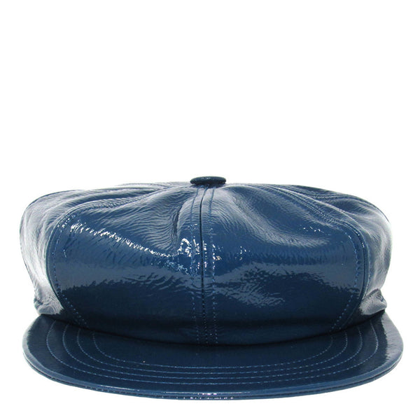 Blue patent leather cap with clear plastic cover on a white background