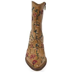 Tan boot with floral embroidery on a white background