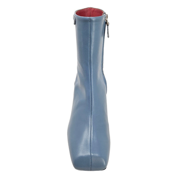 Blue ankle boot with a red interior on a white background