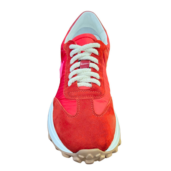 Red sneaker with white laces on a white background